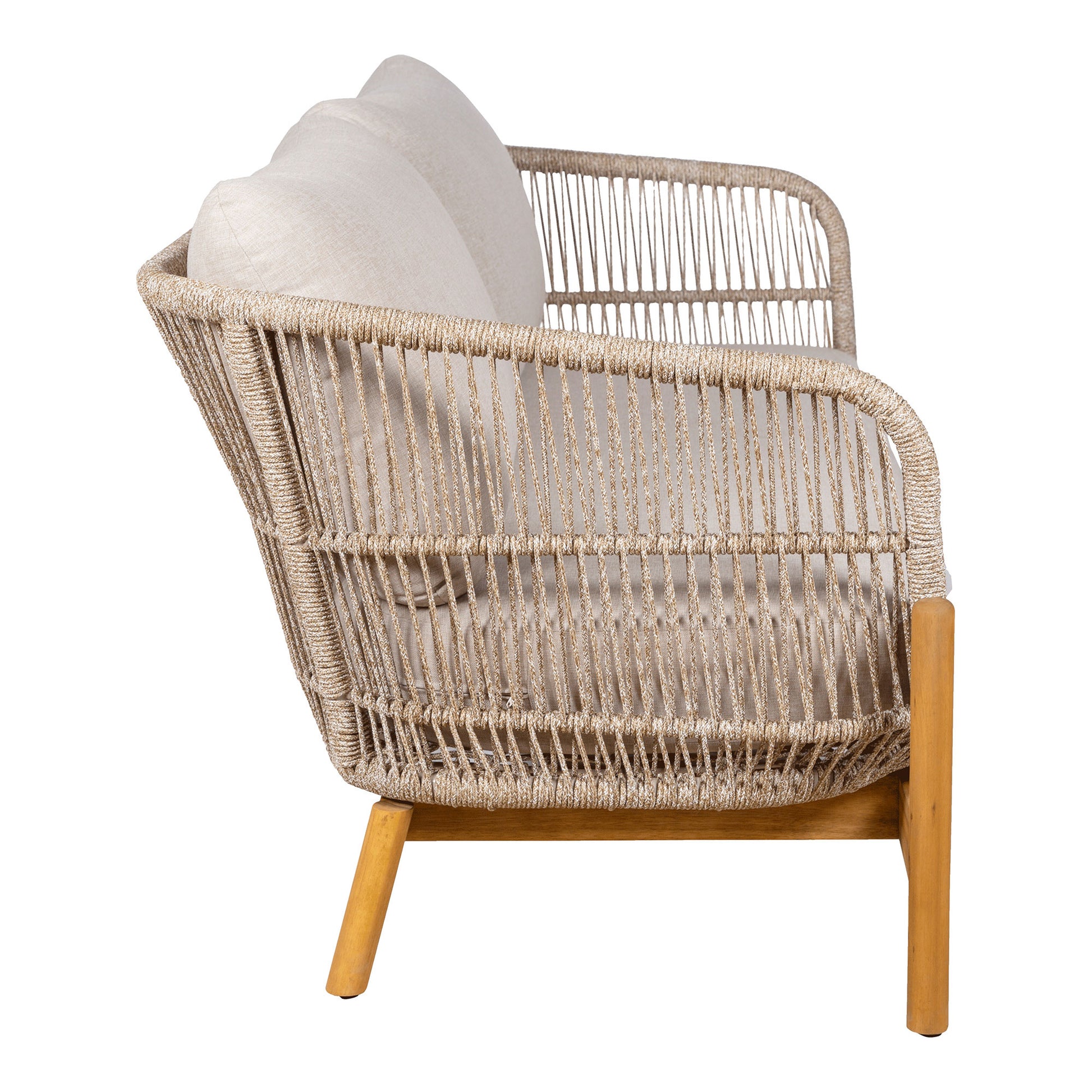 Wicker armchair with wooden legs on a white background