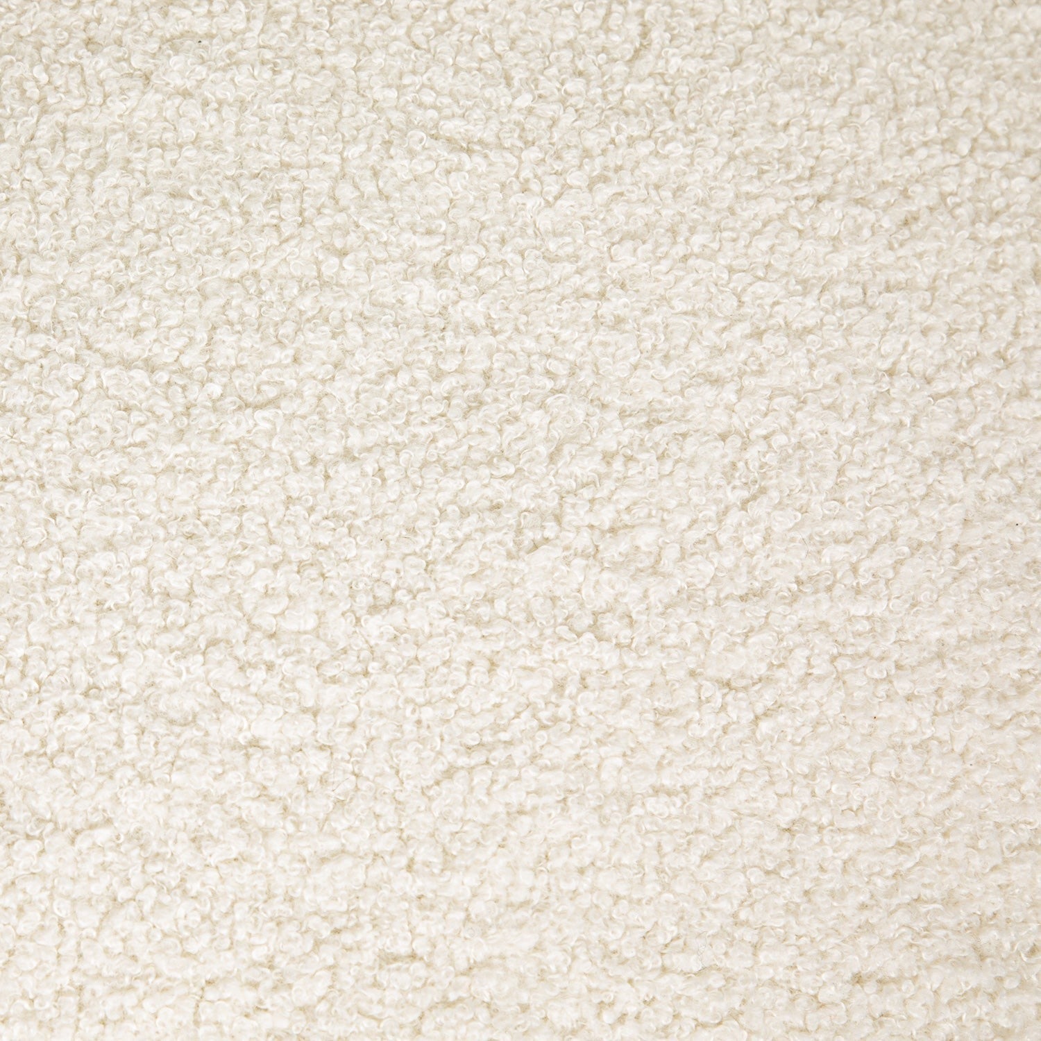 Close-up of a textured beige fabric surface