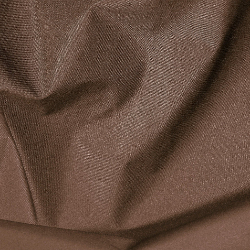 Close-up of brown fabric with folds