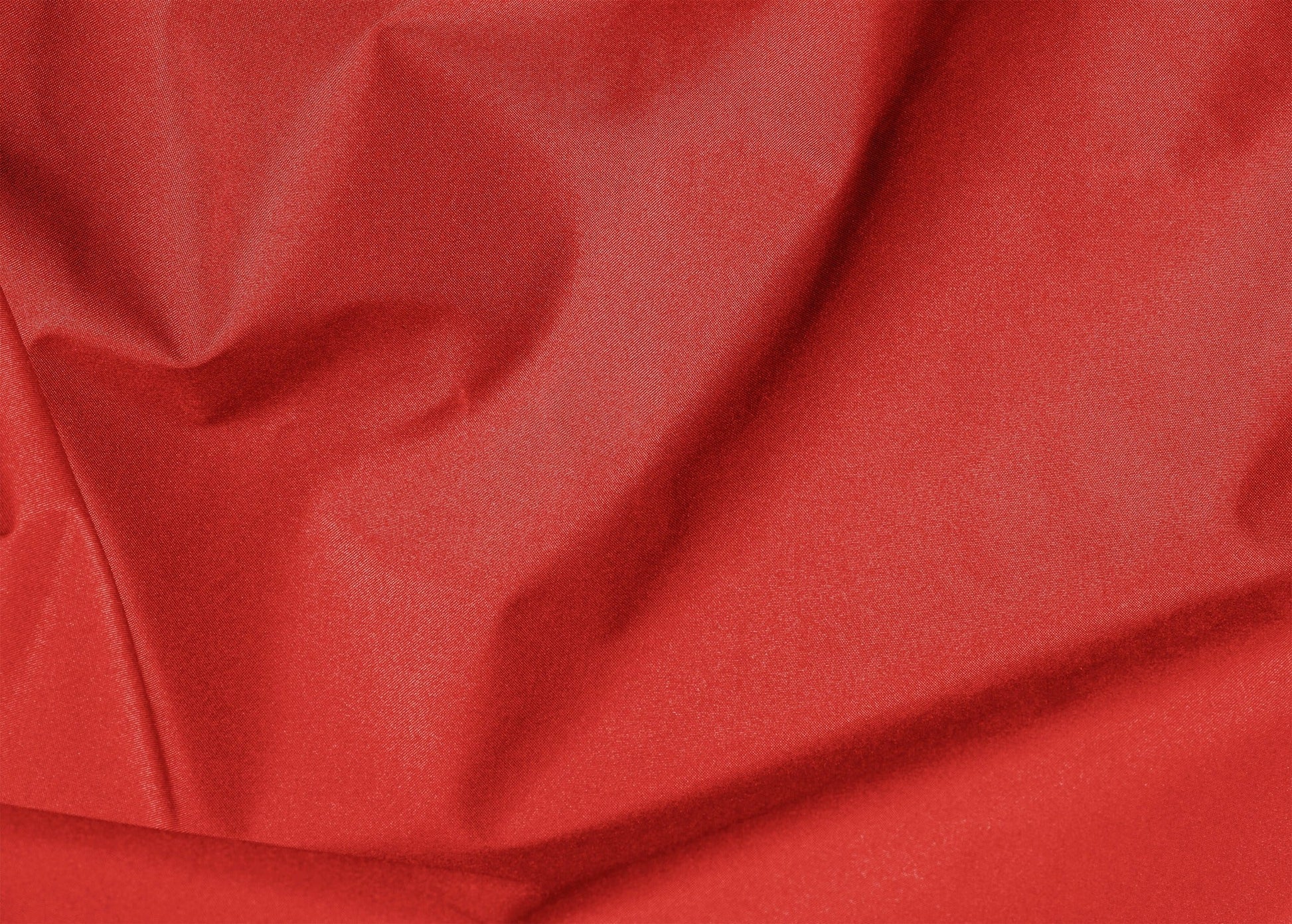 Close-up of red fabric with folds