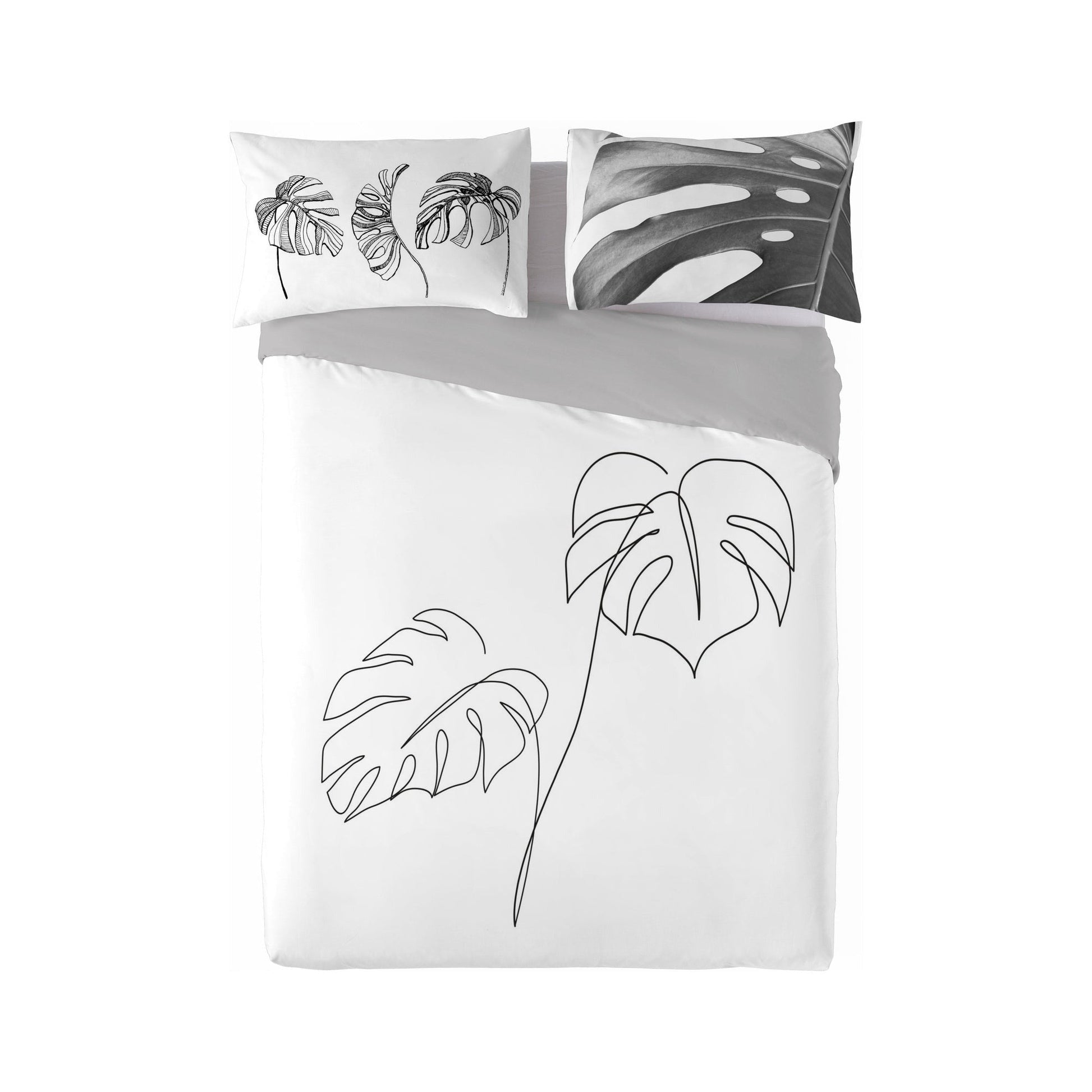 Bedding set with leaf designs on a white background