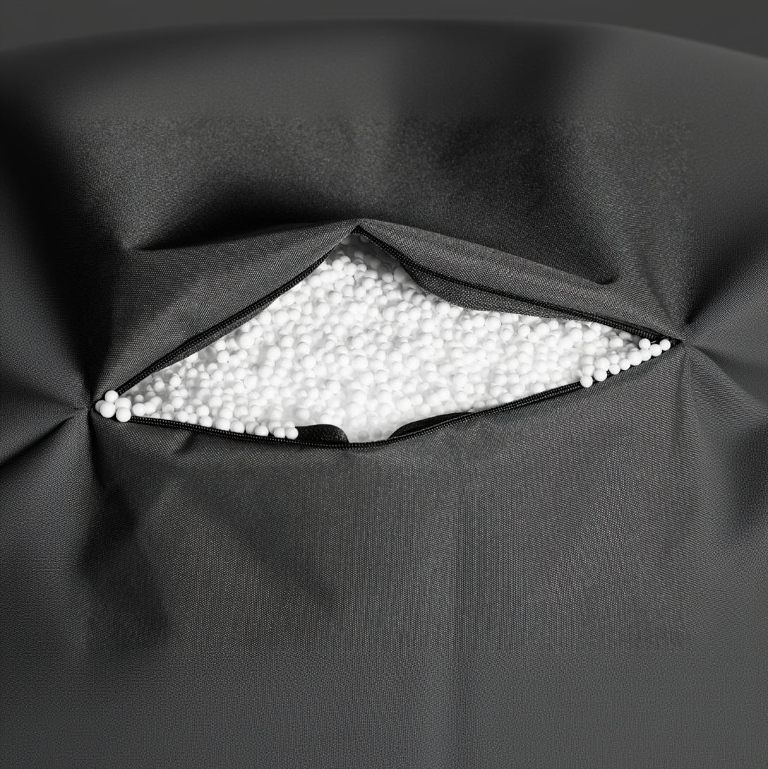 Black fabric with a triangular cutout revealing white beads inside