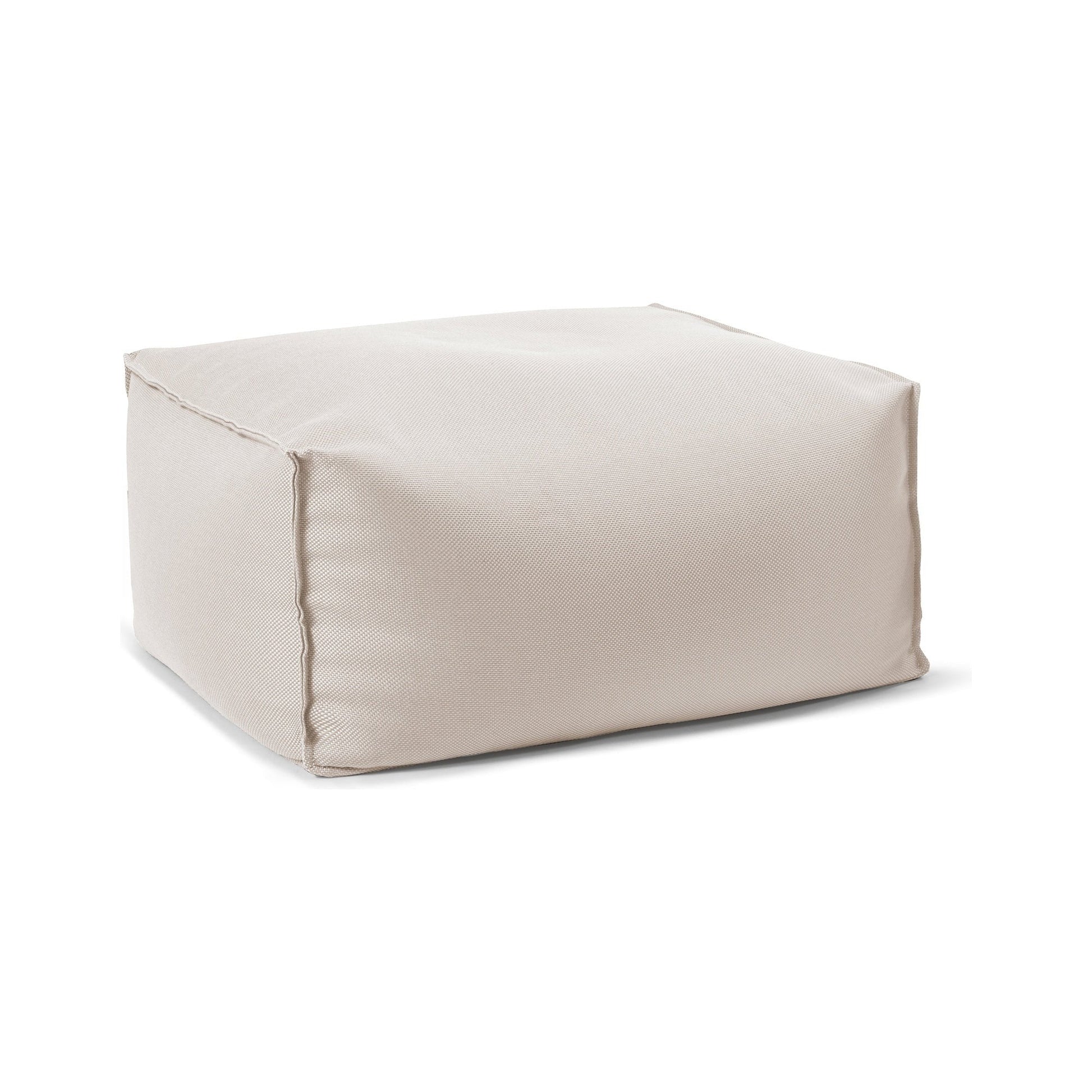Beige cube-shaped ottoman on a white background