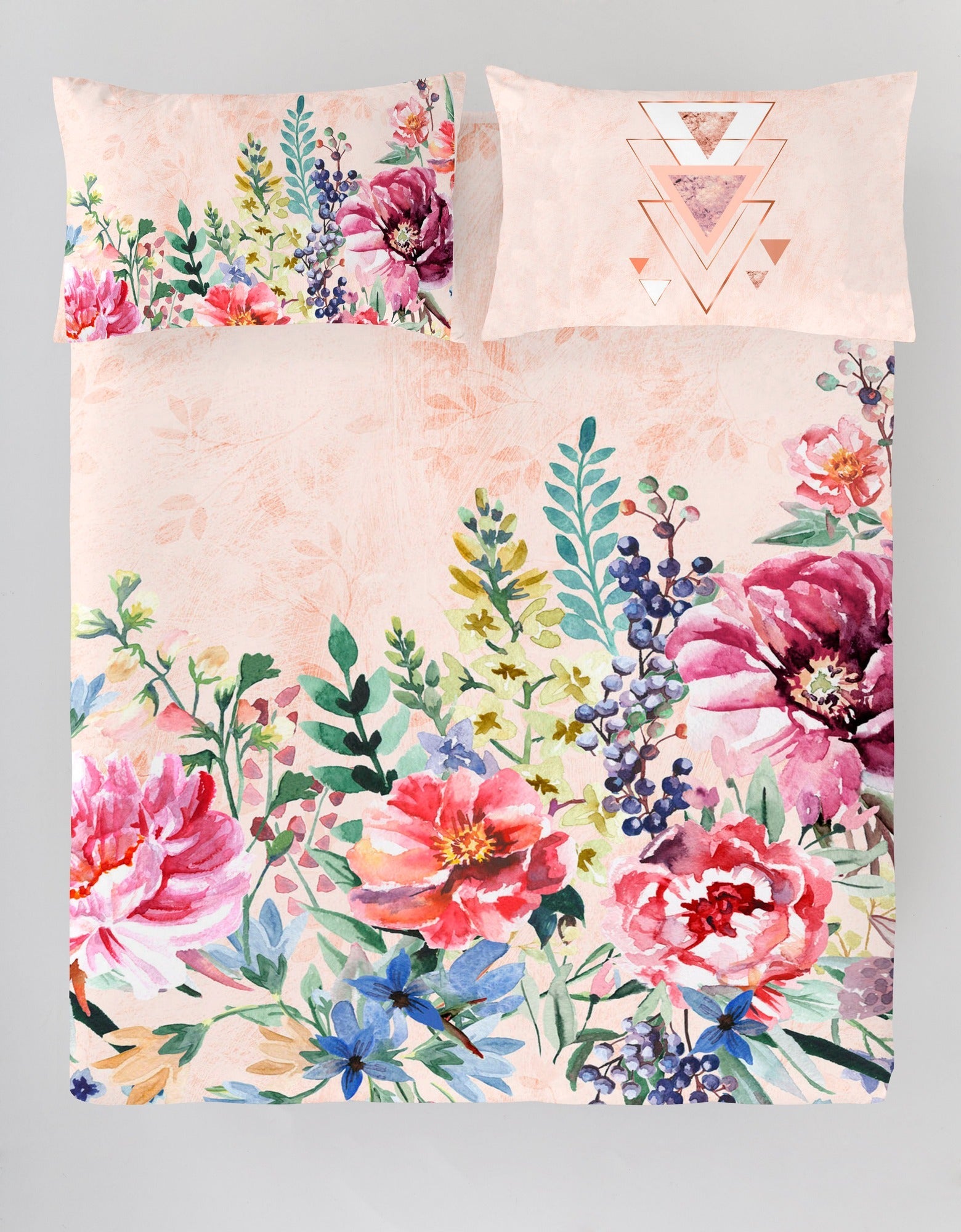 Floral and geometric patterned pillowcases on a plain background