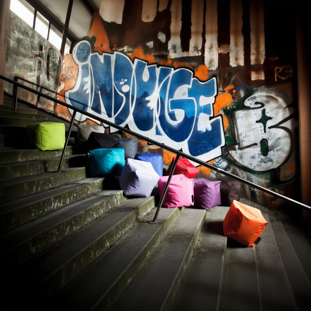 Colorful bean bags on a graffiti-covered staircase