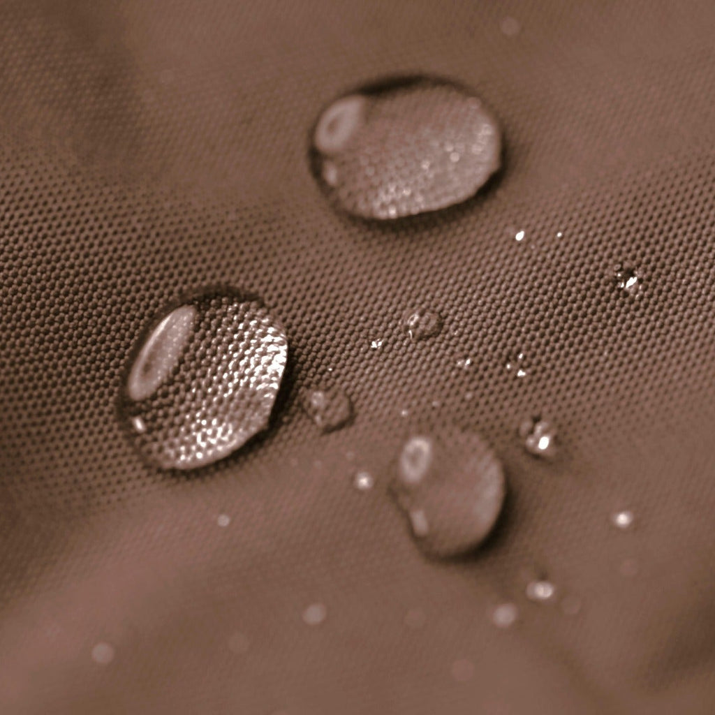 Water droplets on a textured surface in sepia tone