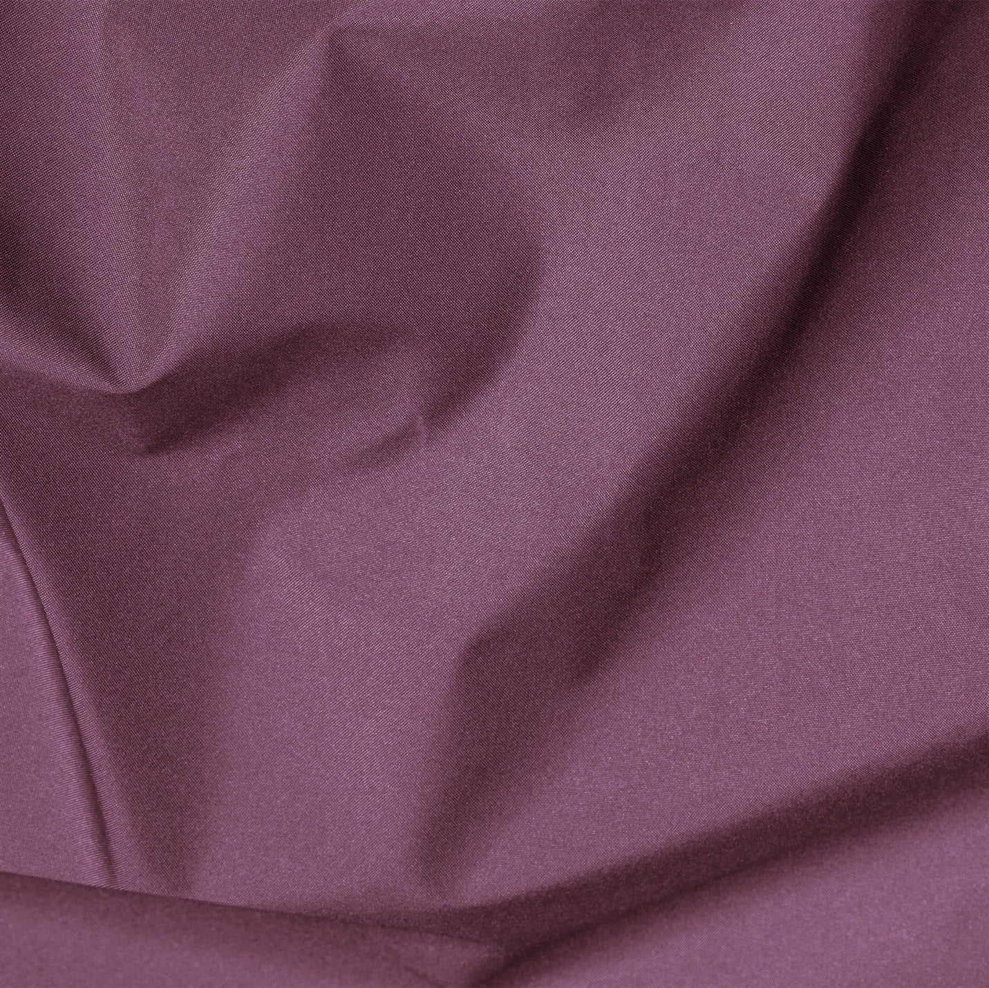 Close-up of purple fabric with folds