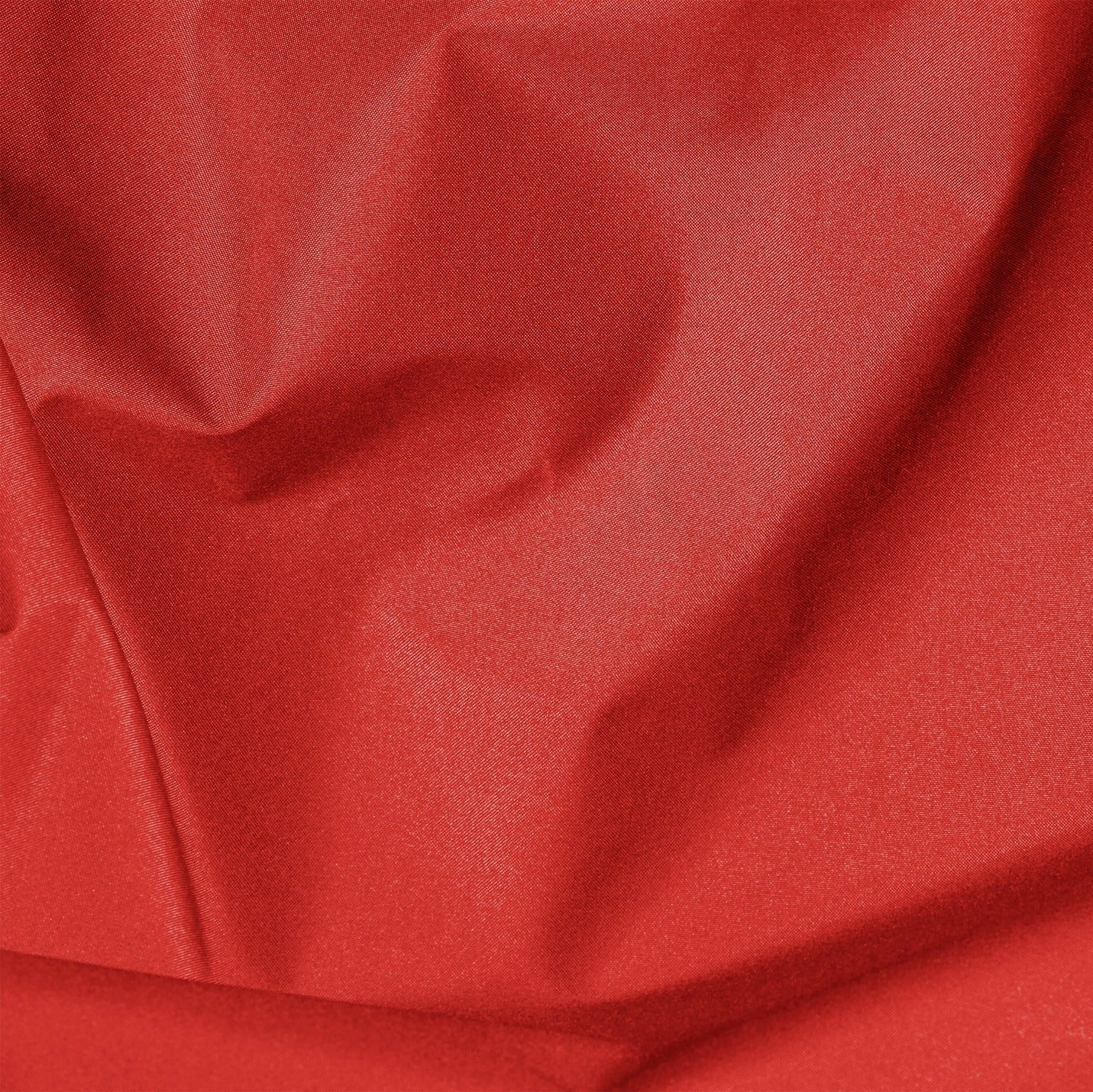 Close-up of red fabric with folds