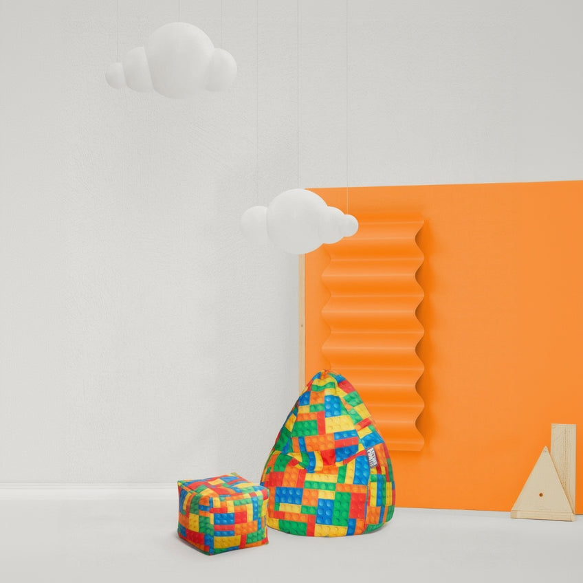 Colorful geometric blocks with a white cloud-like object and orange textured surface on a light gray background.