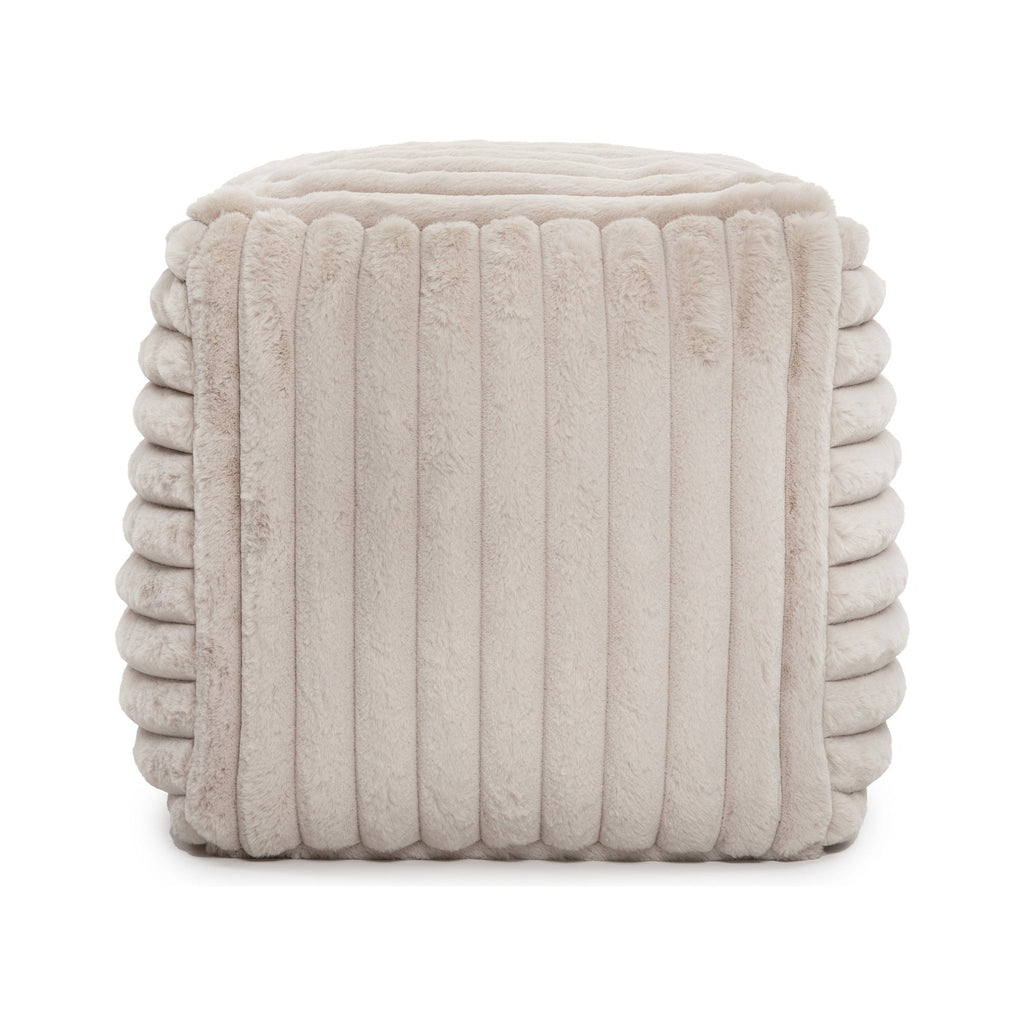 Beige textured cube ottoman on a white background