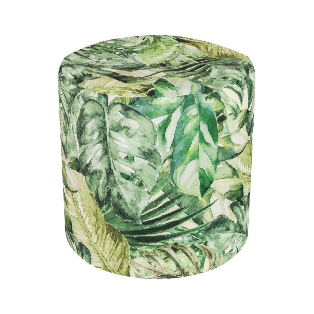 Cylindrical ottoman with tropical leaf pattern on a white background