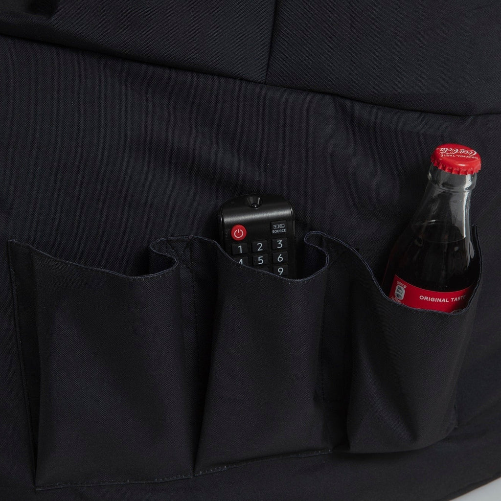 Black bag with a remote control and Coca-Cola bottle in a pocket
