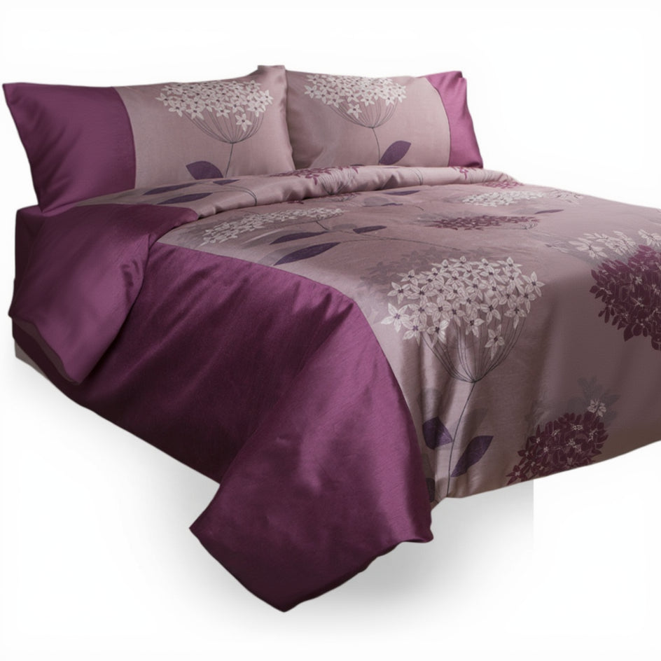 Purple and beige floral patterned bedding set on a white background