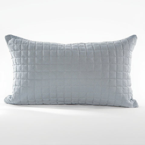 Quilted gray pillow on a white background