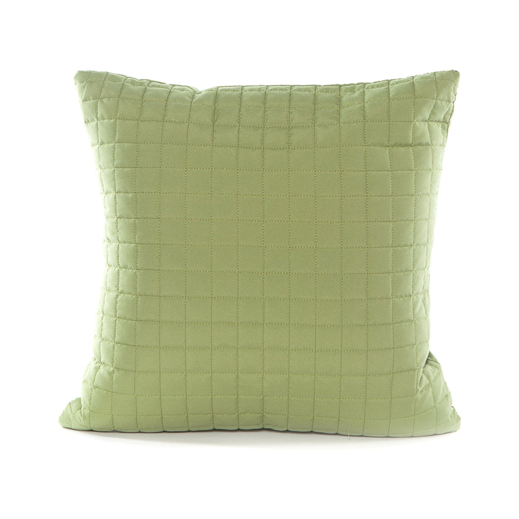 Green quilted pillow on a white background