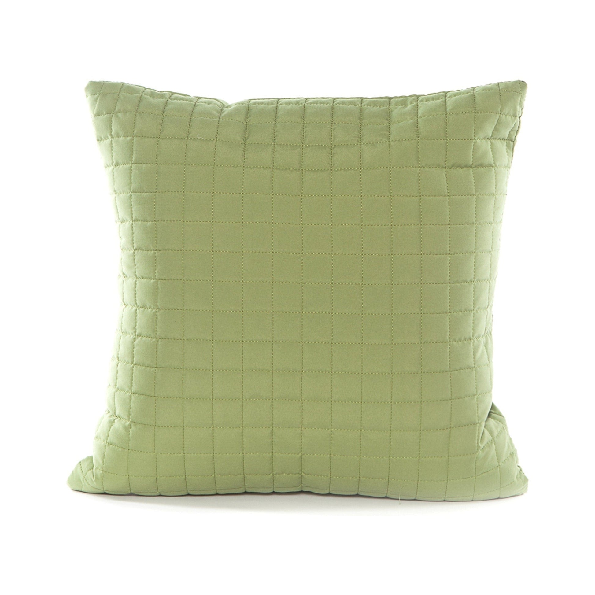 Green quilted pillow on a white background
