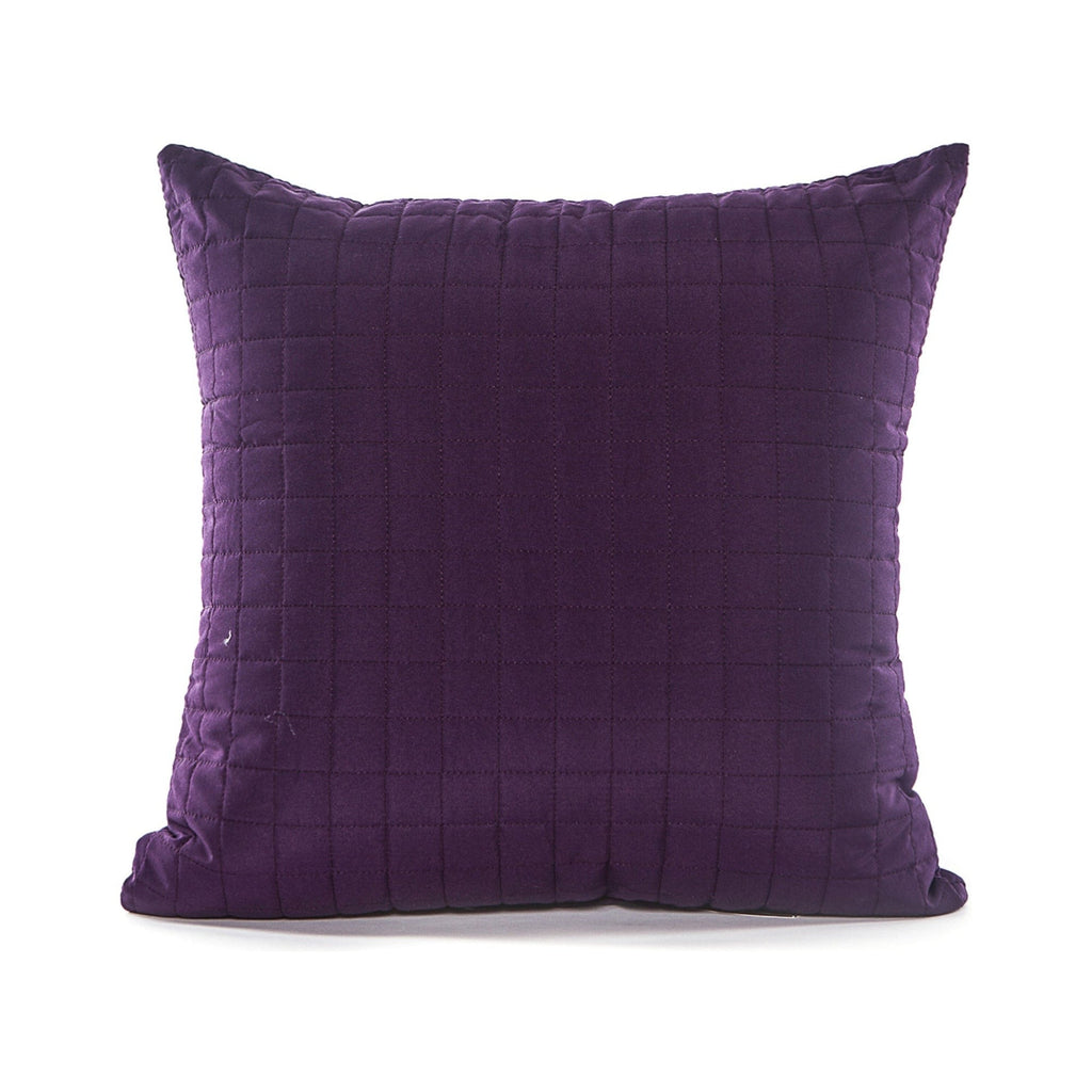 Purple quilted pillow on a white background