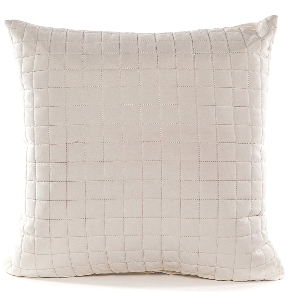 Quilted beige pillow on a white background
