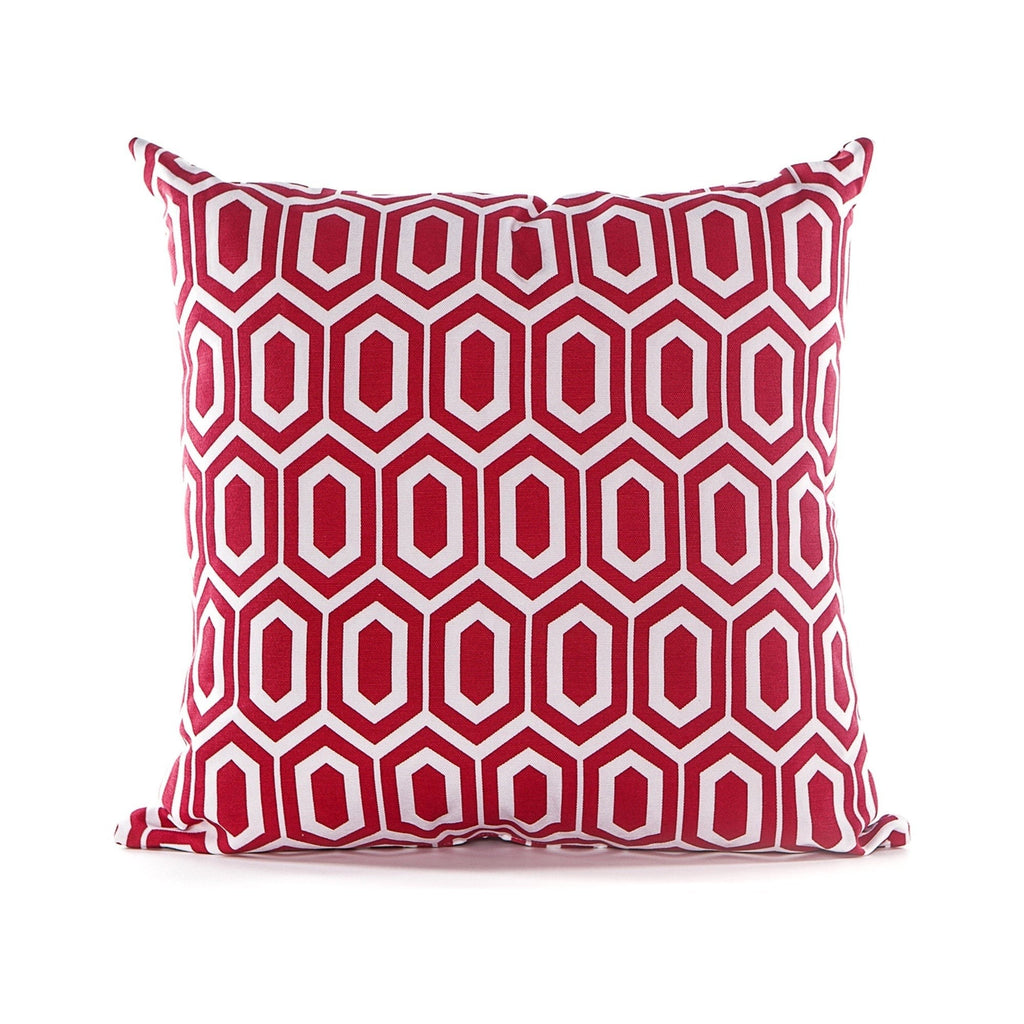 Red and white geometric patterned pillow on a white background