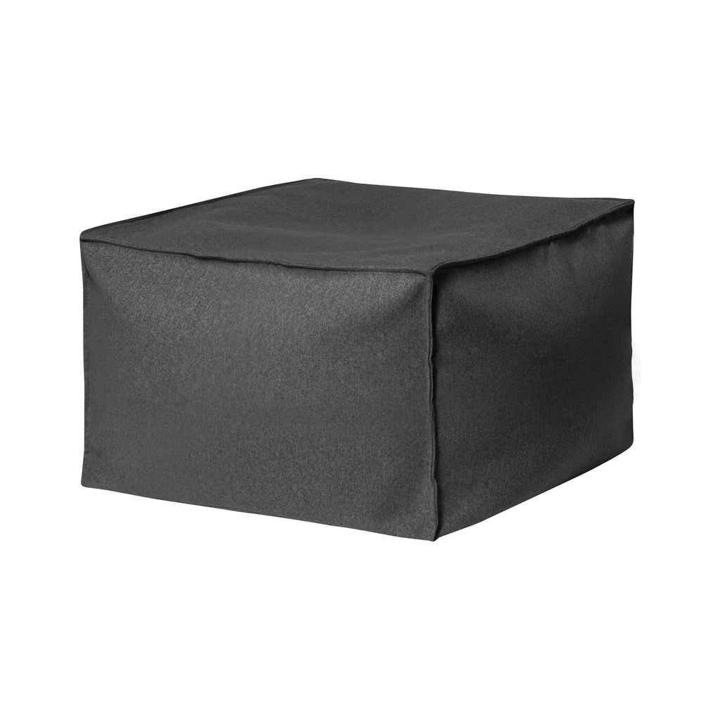 Dark gray cube-shaped ottoman on a white background