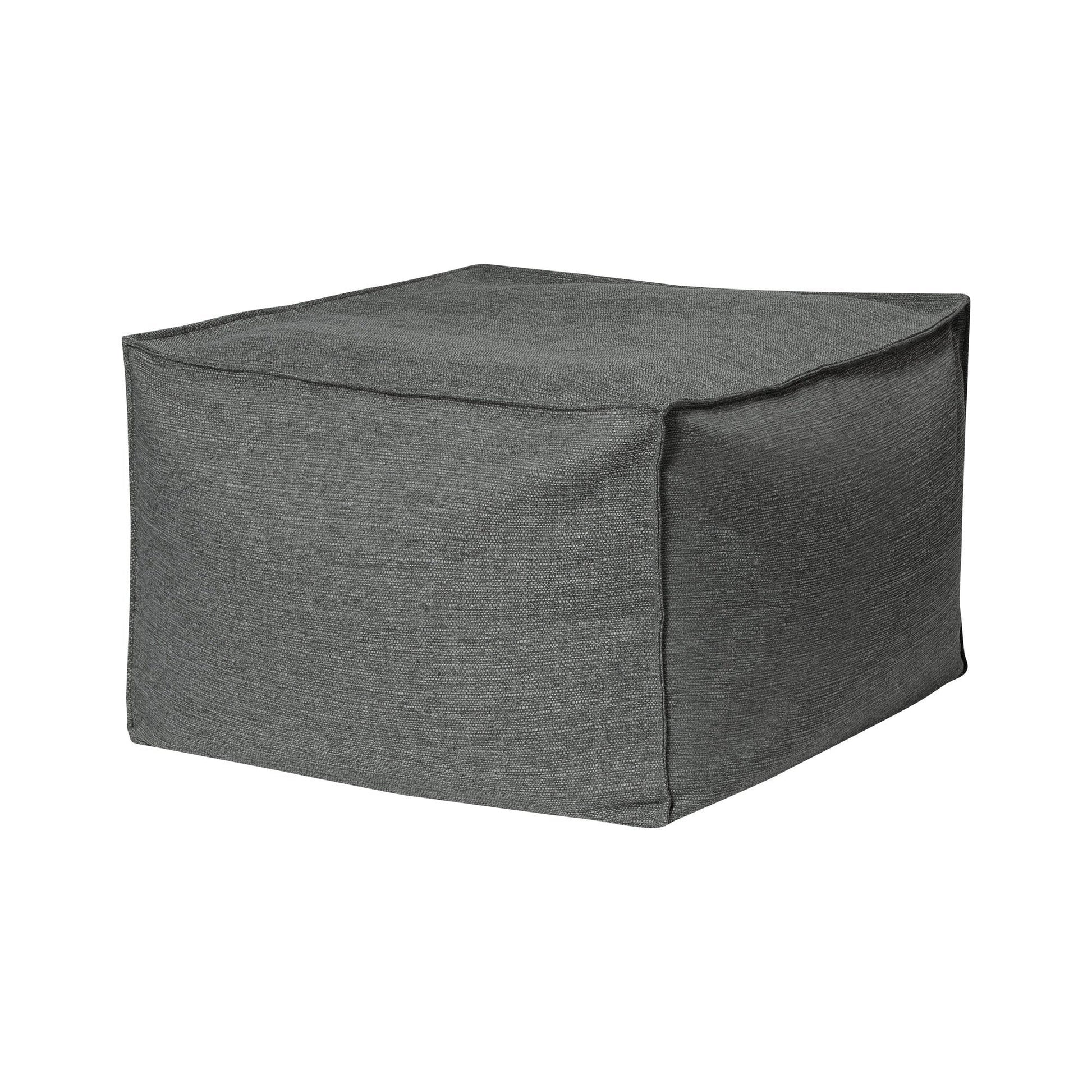 Gray cube-shaped ottoman on a white background
