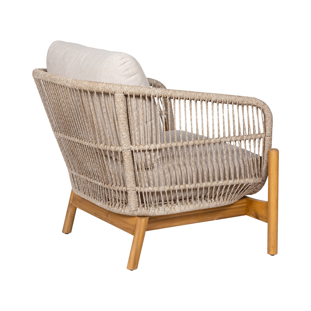 Wicker armchair with wooden legs on a white background