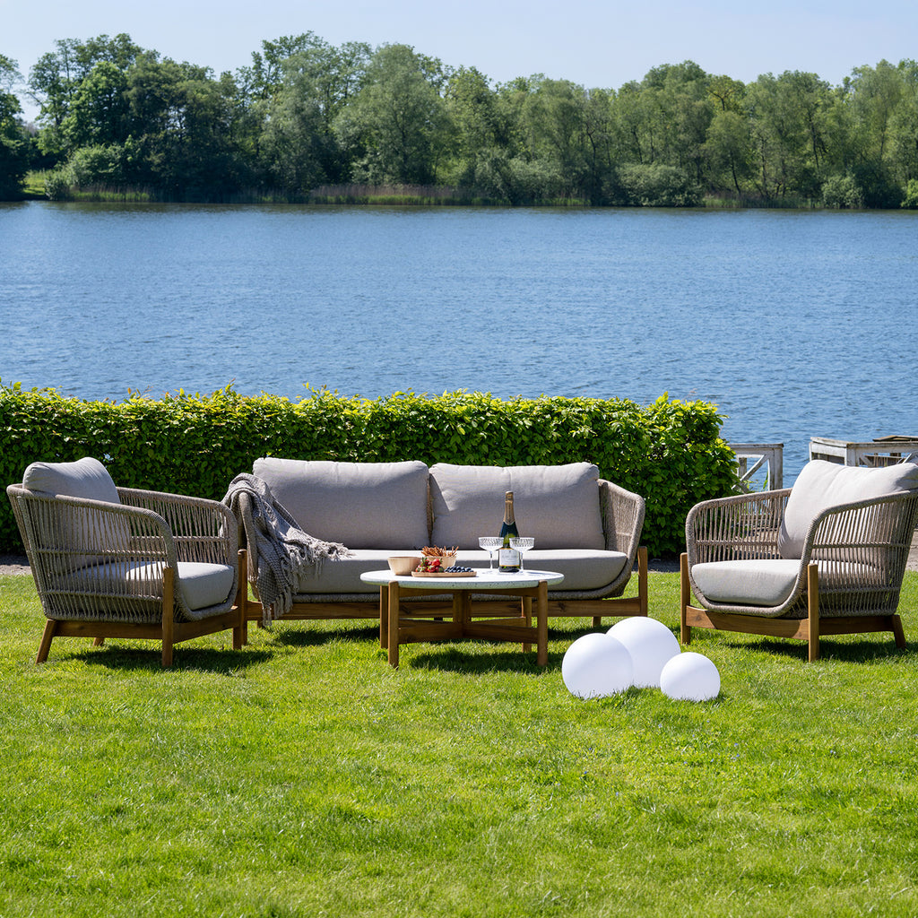 Outdoor furniture set with a lake view