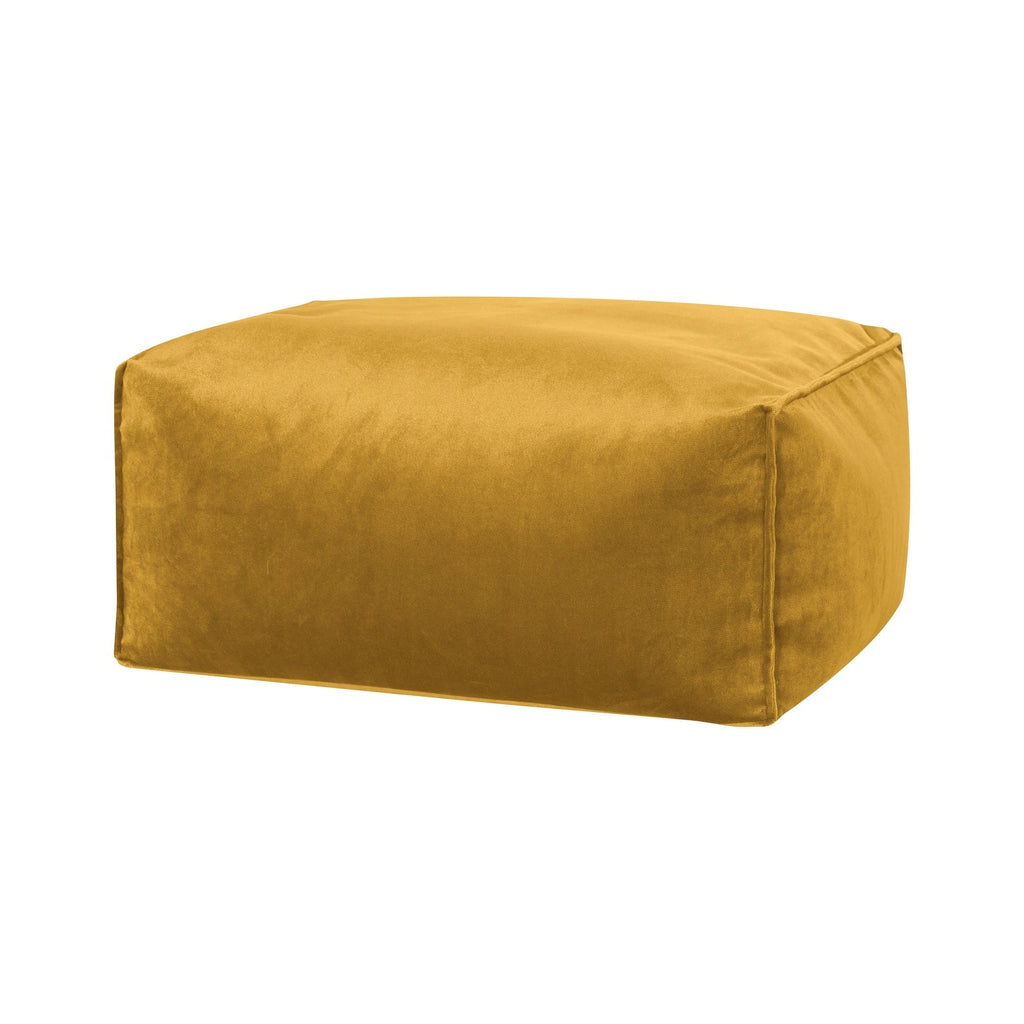 Mustard yellow ottoman on a white background