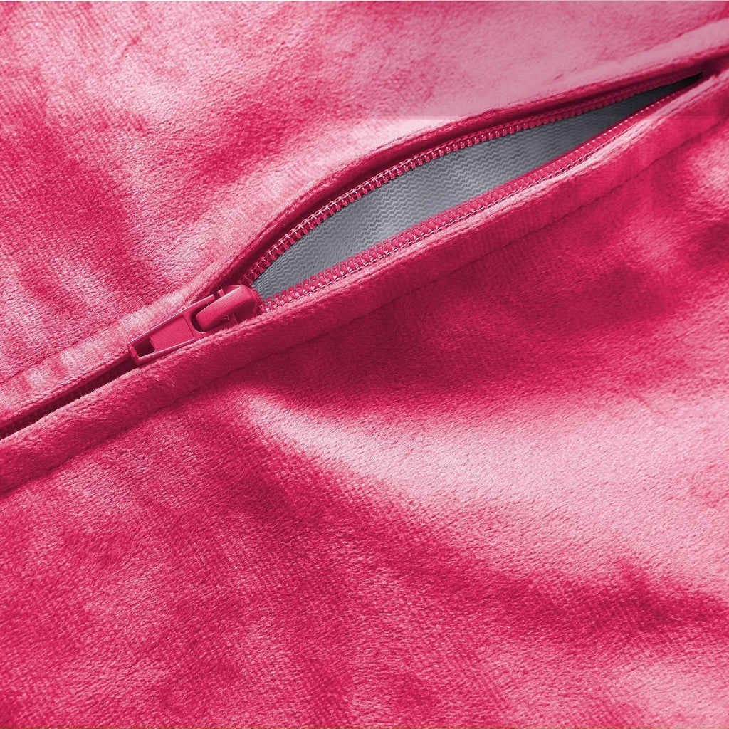 Close-up of a pink fabric with a zipper