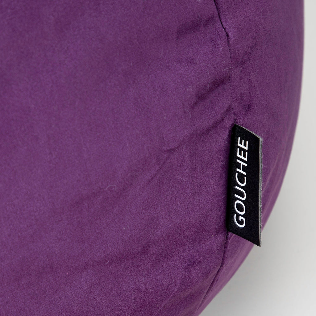 Purple bean bag with 'Gouchee' label on a white background