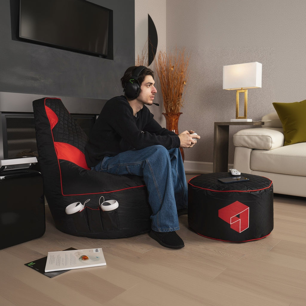 Person playing video games in a modern living room with gaming chair and accessories.
