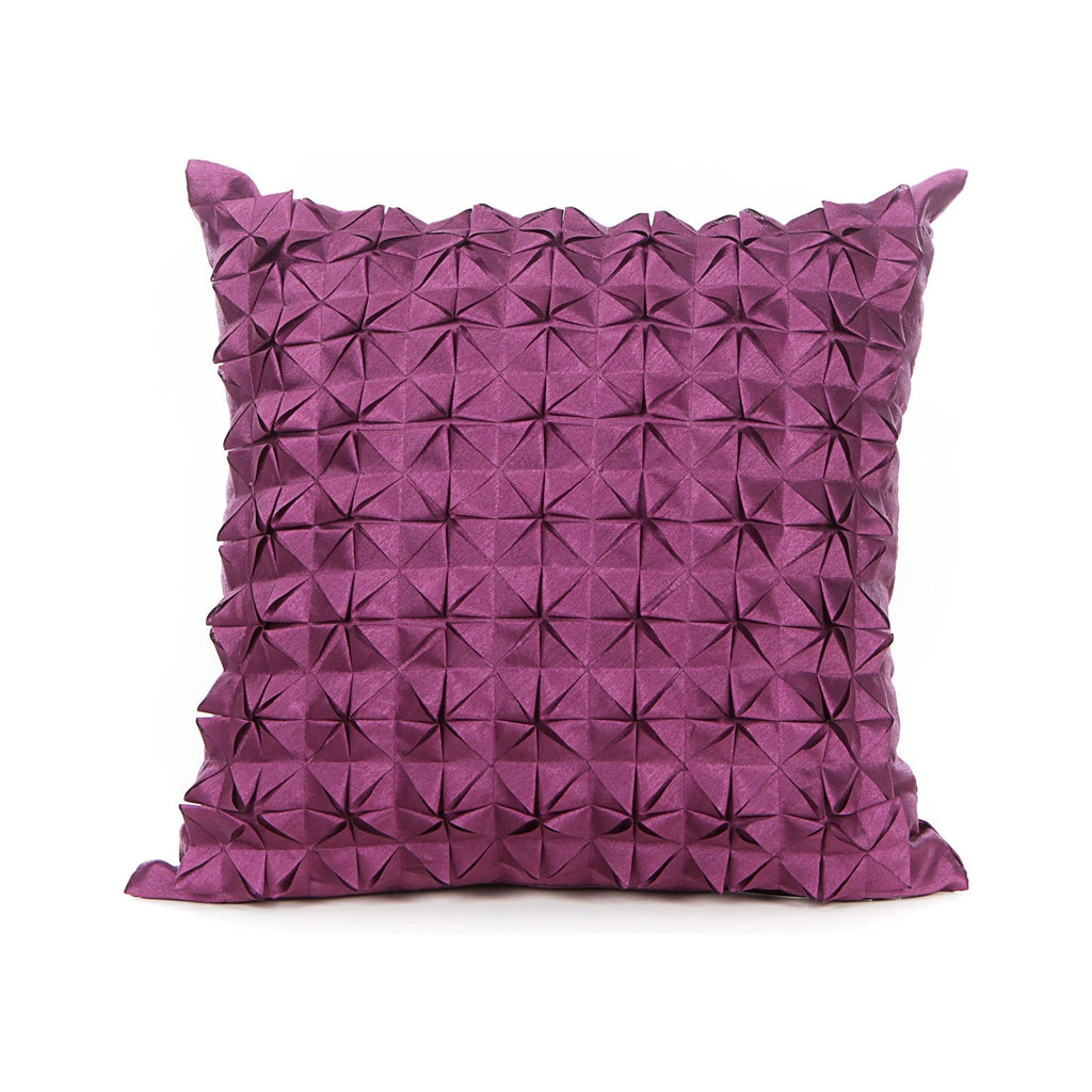 Purple pillow with geometric pattern on a white background