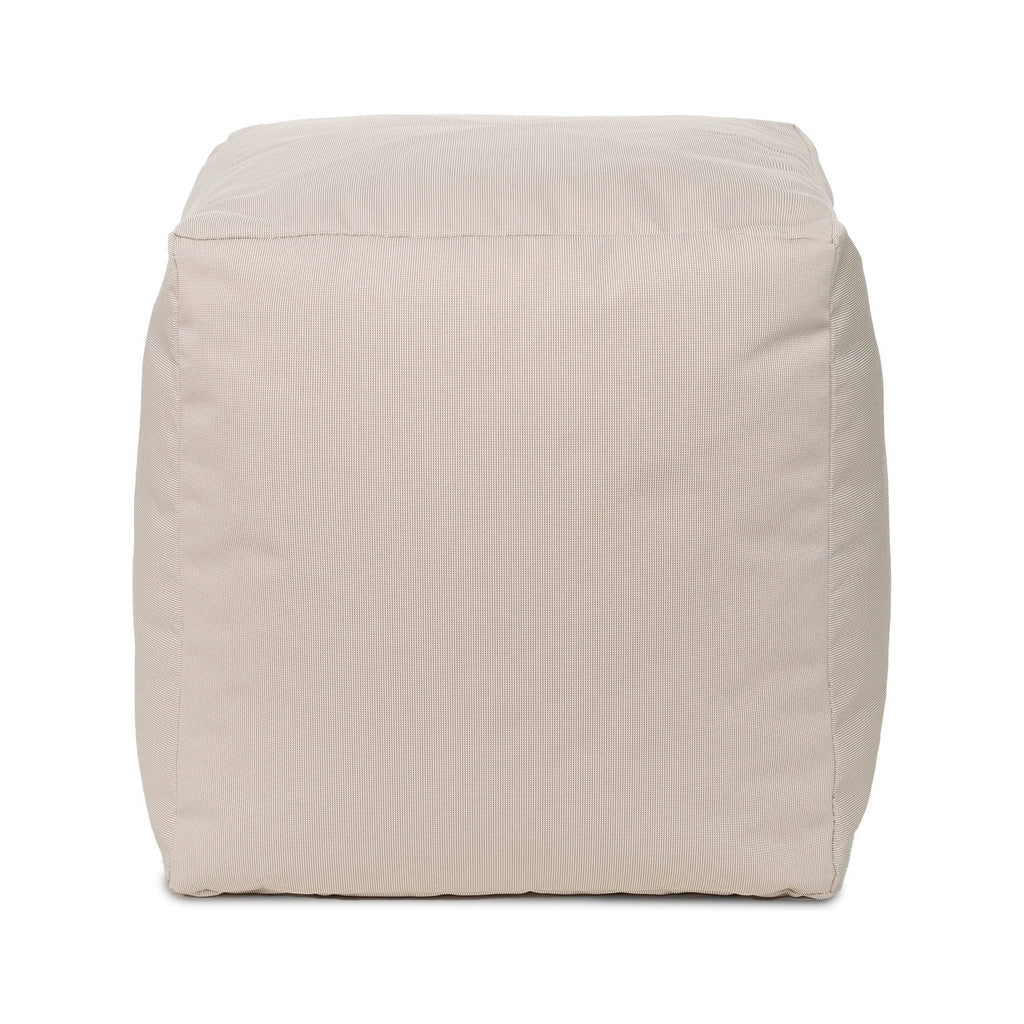 Beige cube-shaped ottoman on a white background