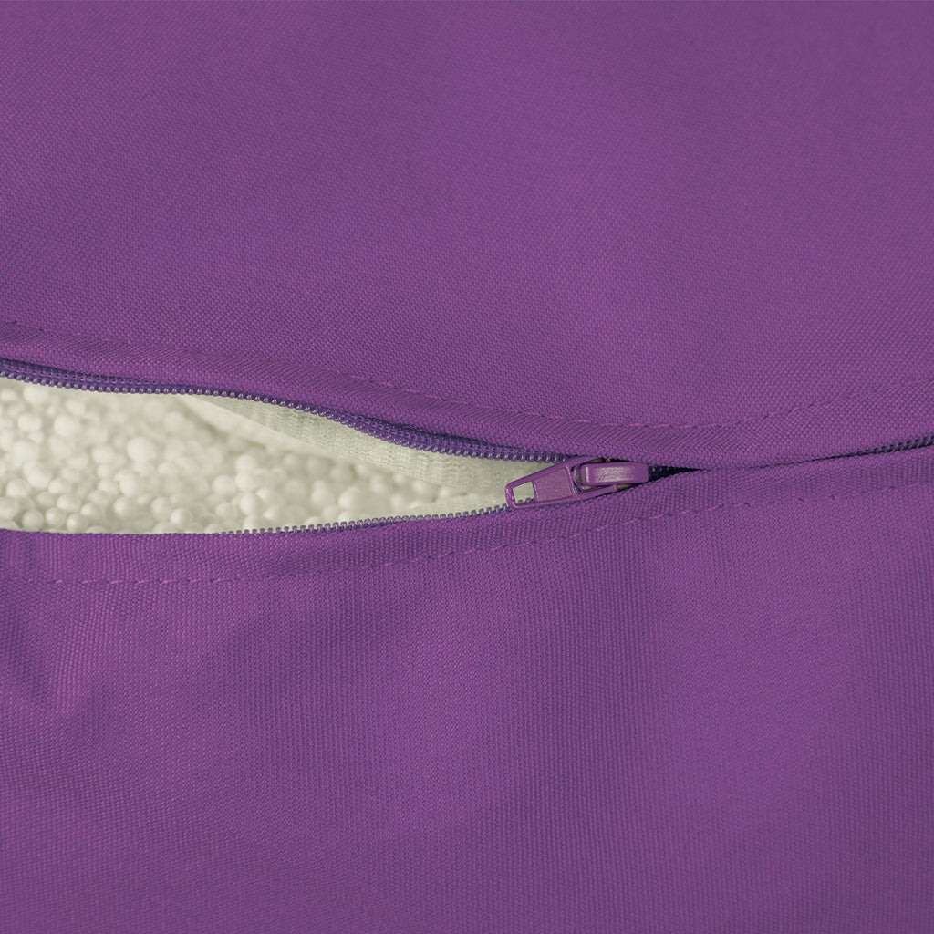 Close-up of a purple zipper on a product, with white interior visible.