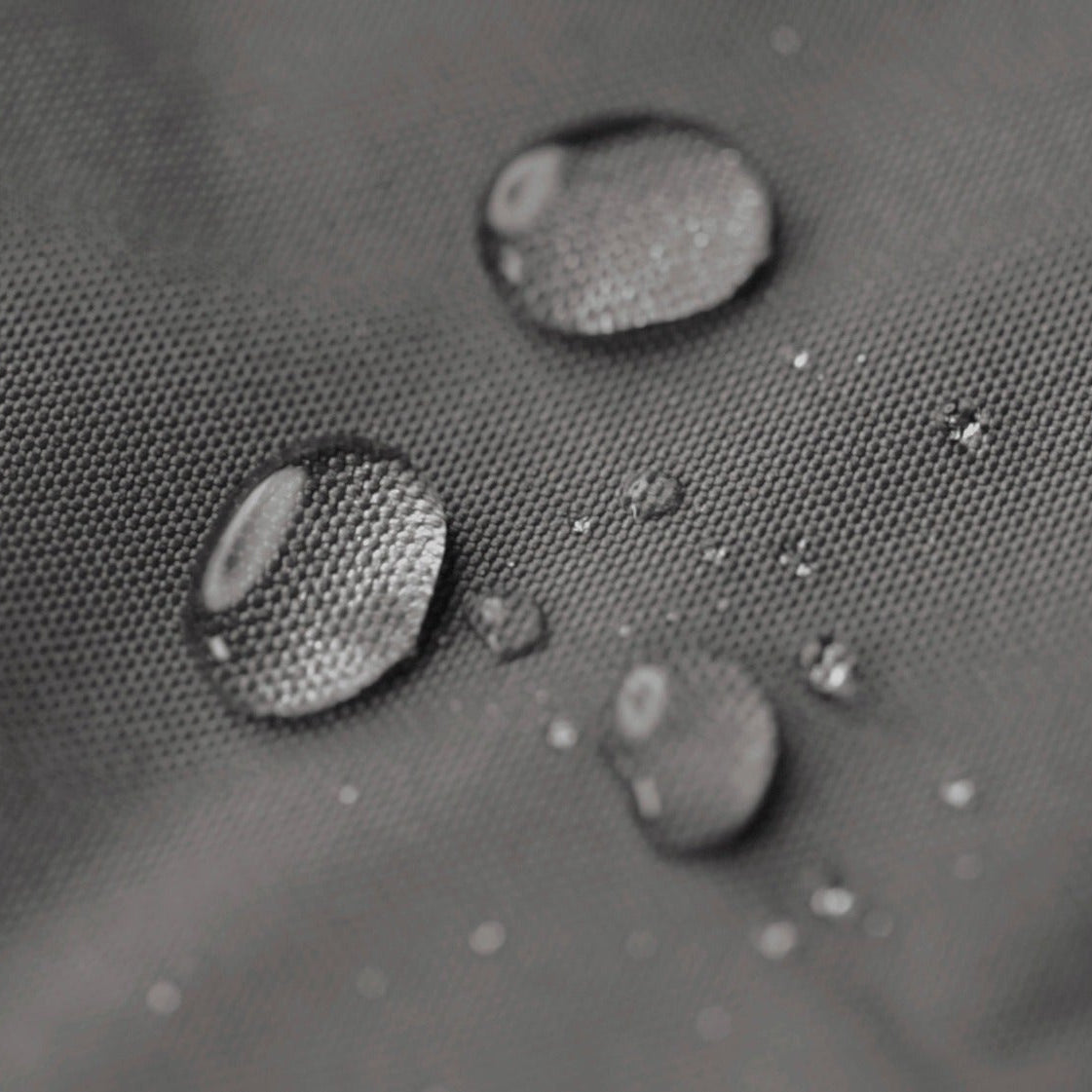 Close-up of water droplets on a textured surface