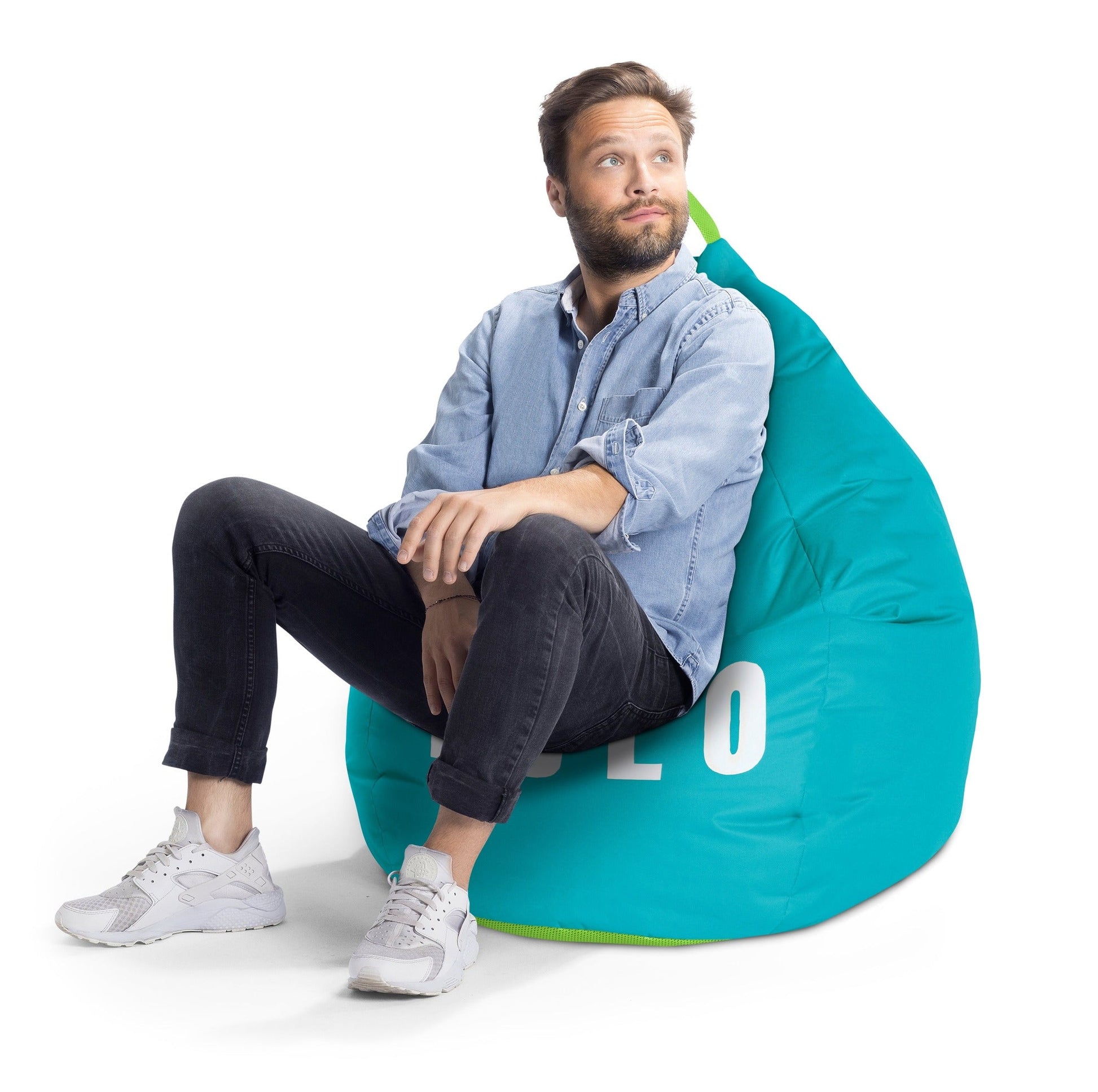 Man sitting on a teal bean bag chair with 'LO' branding on a white background