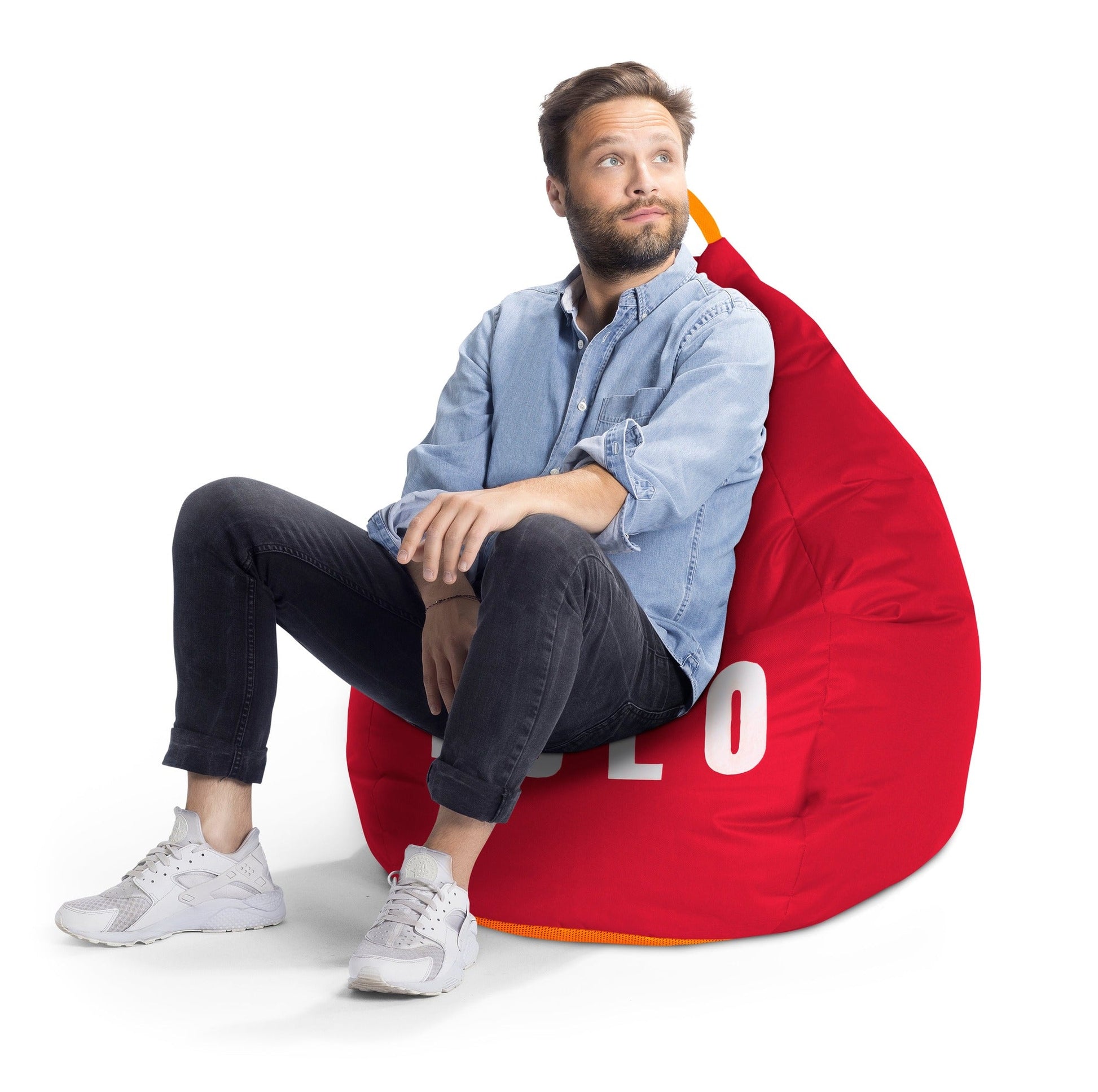 Man sitting on a red bean bag chair with 'LOL' on a white background